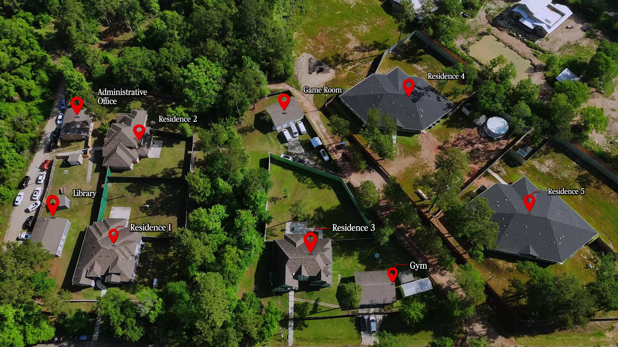 Aerial view of the New Era RTC South campus showing the homes, administrative office, game room, library, and gym across three acres